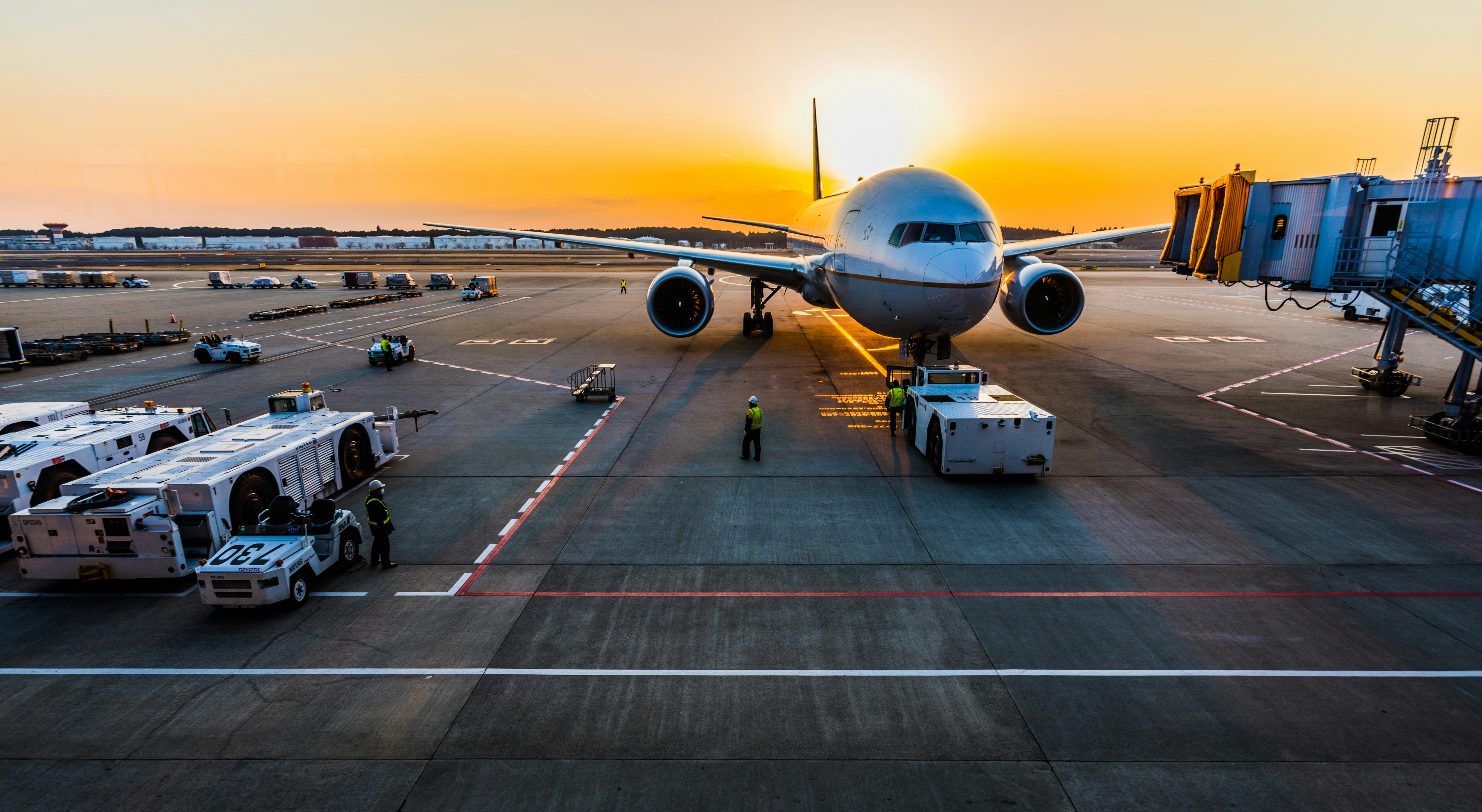 Naoero Airlines crew and passengers walking through the terminal